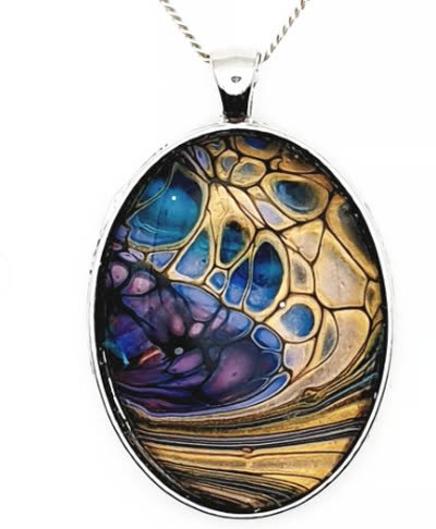 The actual pendant — gold cells over violet and indigo
